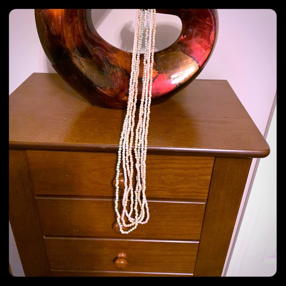 Four Beaded necklaces They are old.